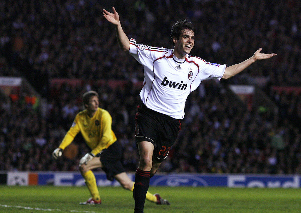 Manchester, UNITED KINGDOM: AC Milan's Brazilian midfielder Ricardo Kaka (R) celebrates scoring his second goal past Manchester United's Dutch goalkeeper Edwin Van der Sar during their European Champions League semi final first leg football match at Old Trafford in Manchester, north west England, 24 April 2007. AFP PHOTO/ANDREW YATES (Photo credit should read ANDREW YATES/AFP via Getty Images)